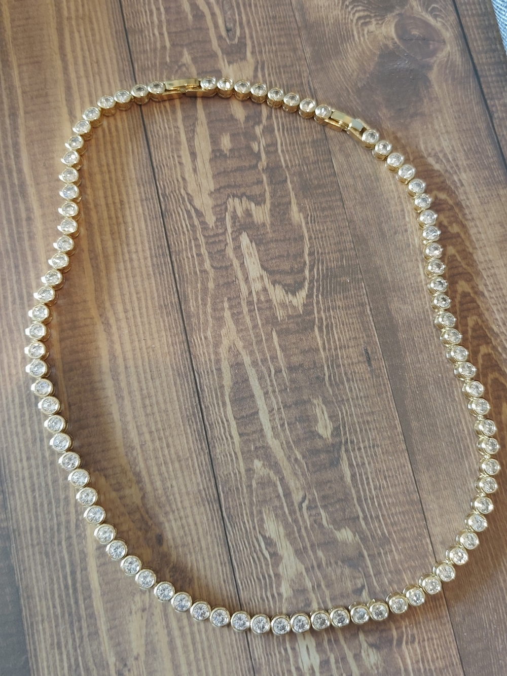 The surface is plated with a thin layer of real gold 14k. 16" Reg 18" Ext.